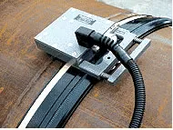 A CMOS scanner being used on a pipeline girth weld. Photo courtesy of American Welding Society